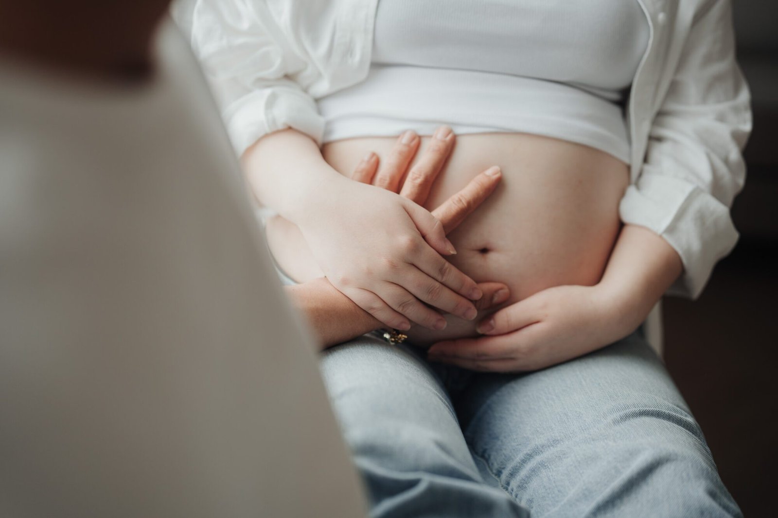 home maternity photography session with soft natural light