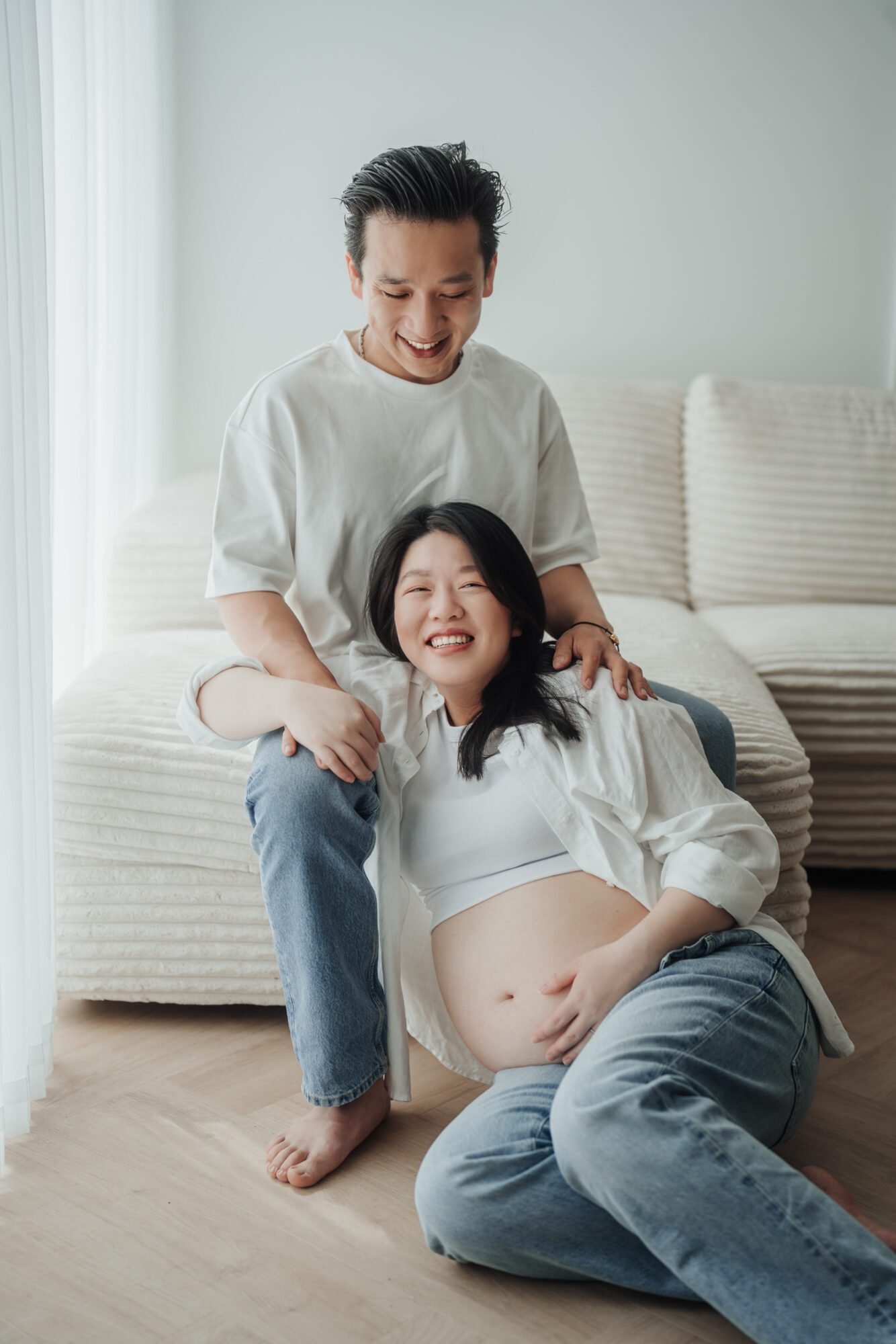 Amsterdam maternity portrait with soft daylight and emotion