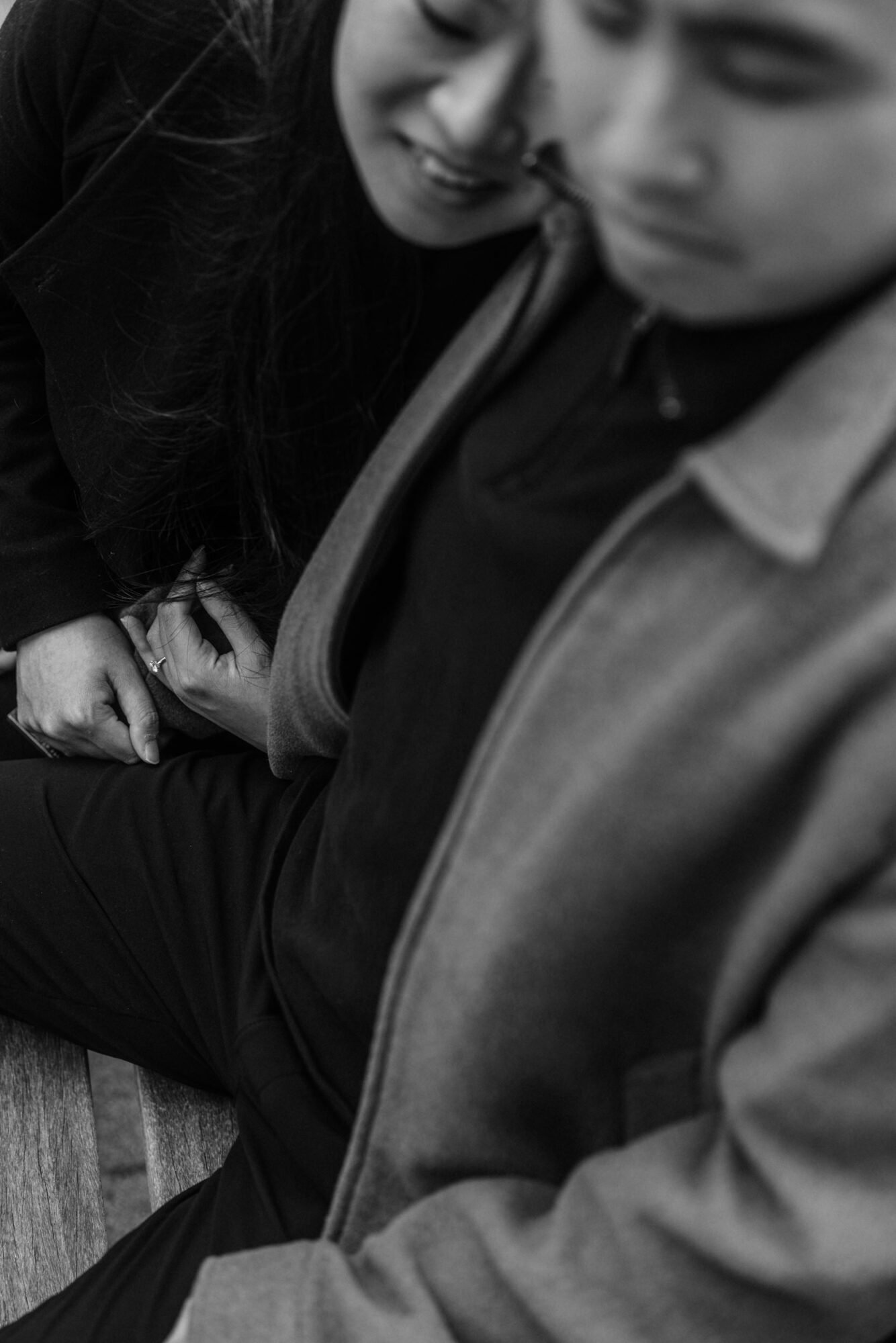 Black-and-white couple portrait near Erasmus Bridge