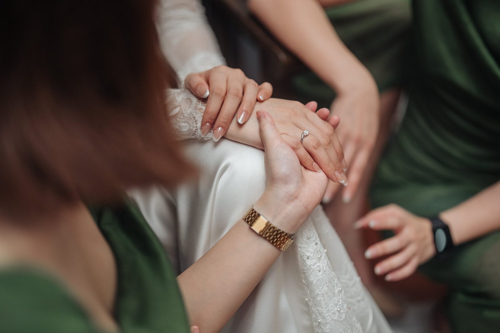 Bridesmaids praying for Silver together on Silver’s wedding morning by Cliff Choong Photography