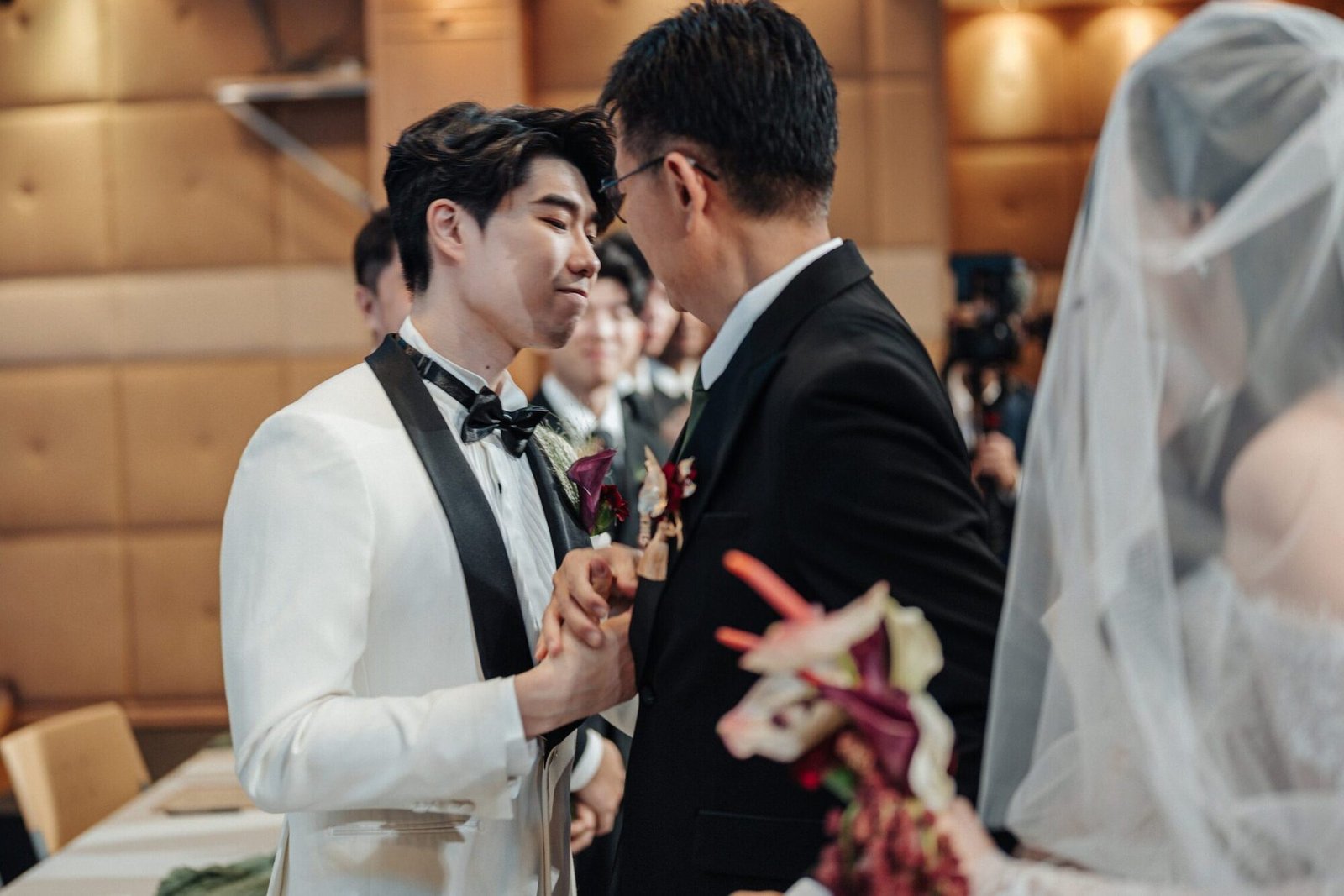 Silver’s father placing her hand into Yi Shien’s